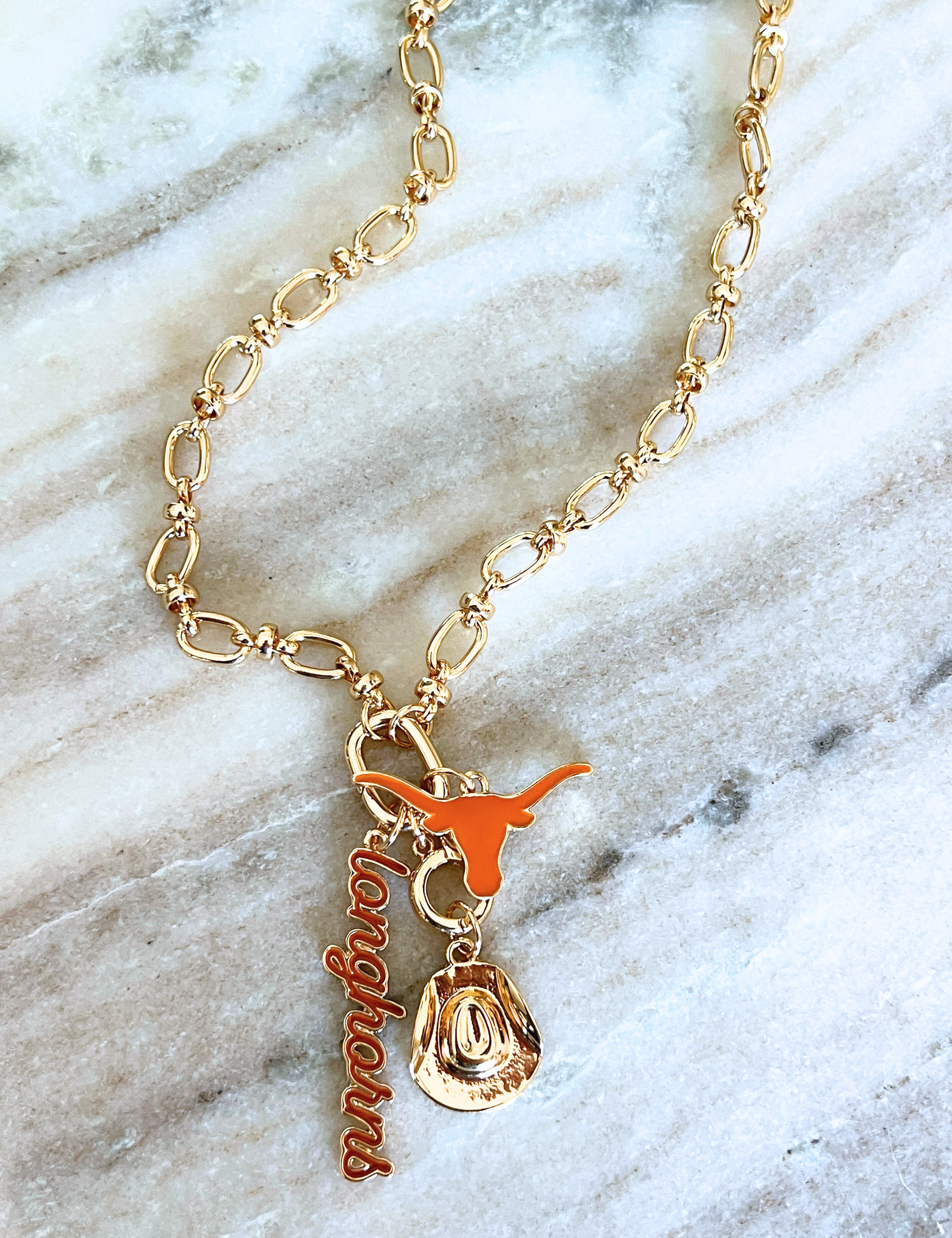 longhorns_charm_flatlay.png