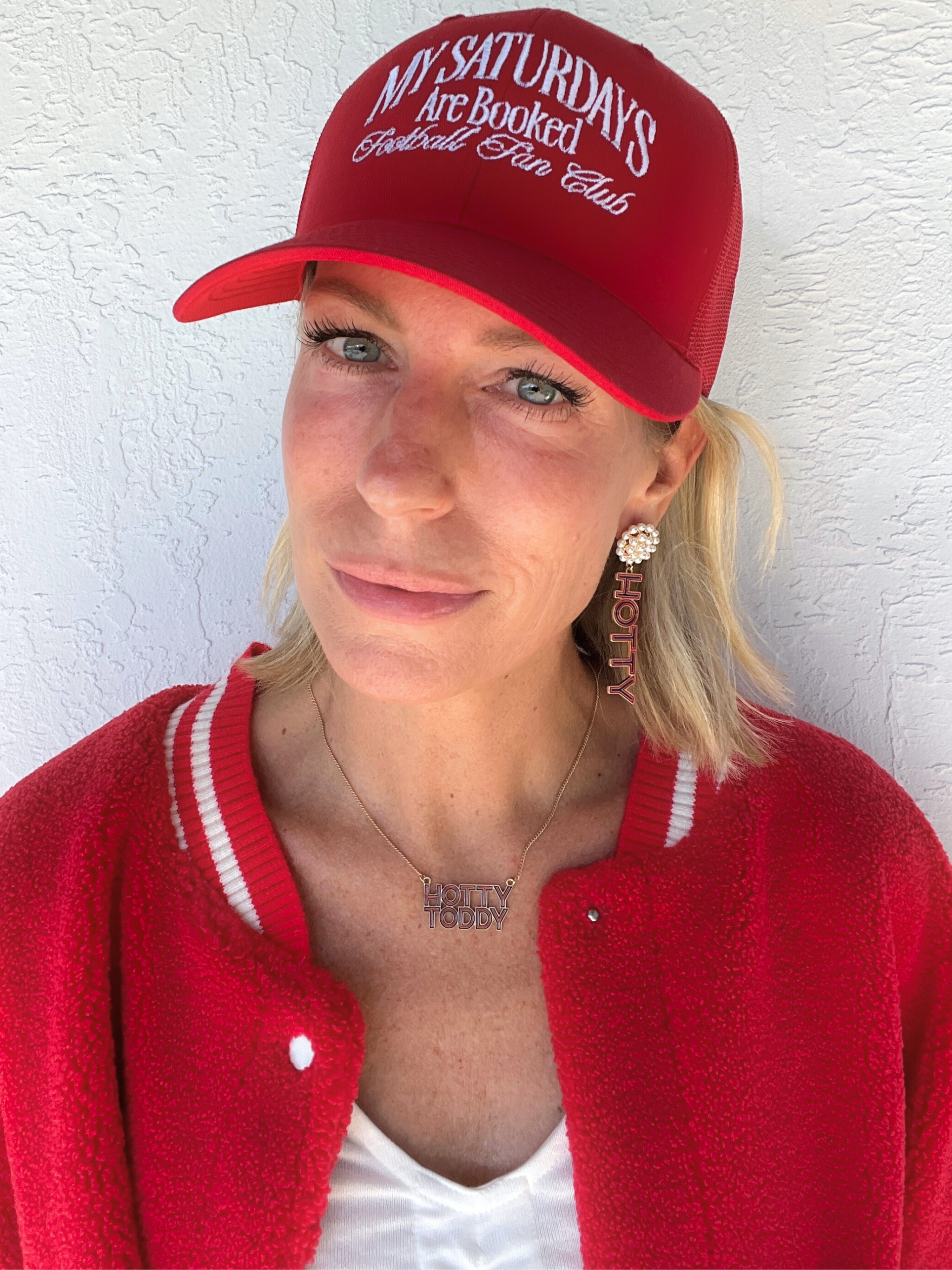 My Saturdays Are Booked Trucker Cap