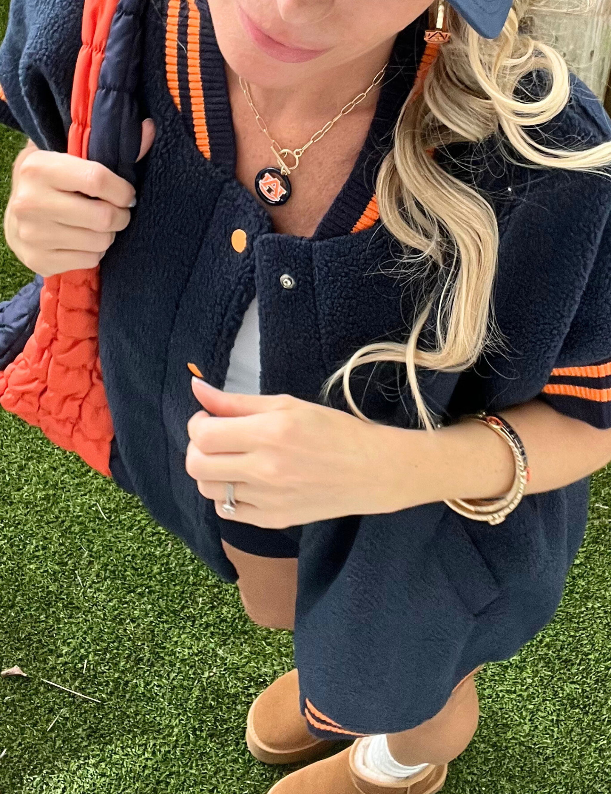 varsitysherpavestnavyorange30.png